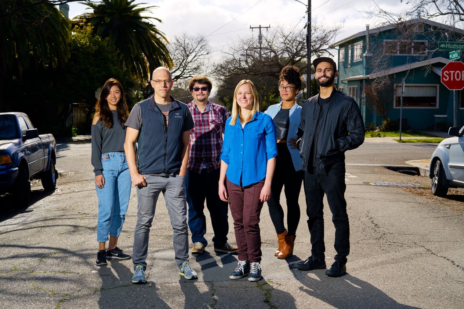 A picture of Elevate founders Masha and Robert standing on the streets of Berkeley with four early employees in 2018